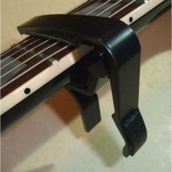Каподастр Jim Dunlop Trigger Capo Acoustic Curved Black Фото 3