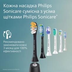 Электрическая зубная щетка Philips HX4033/32 Фото 8
